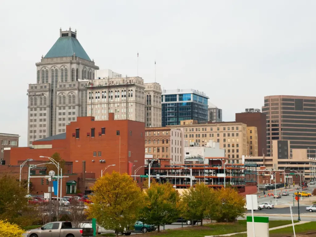 Downtown Greensboro, NC skyline in autumn with historic and modern buildings