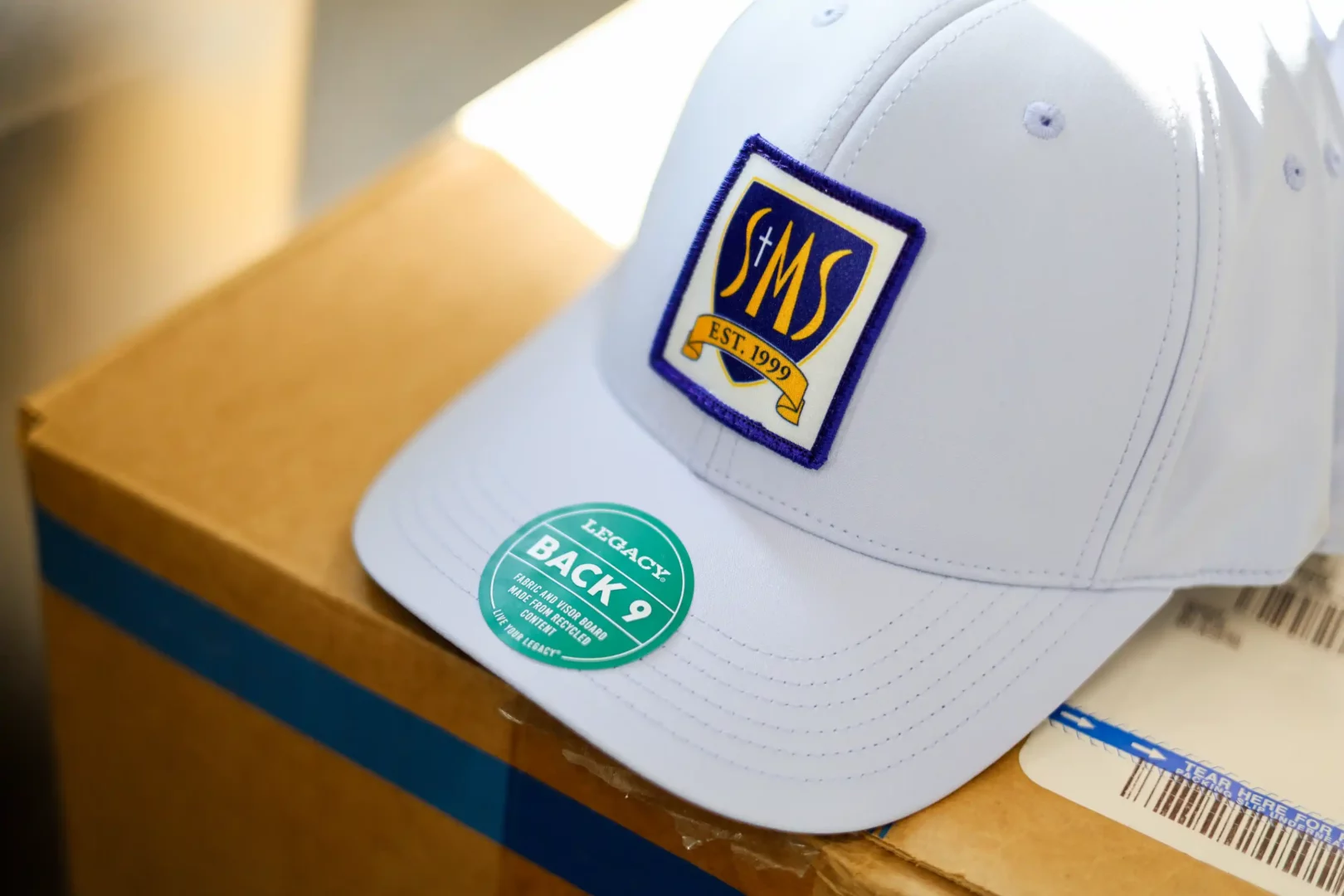 finished-school-crest-cap-angle