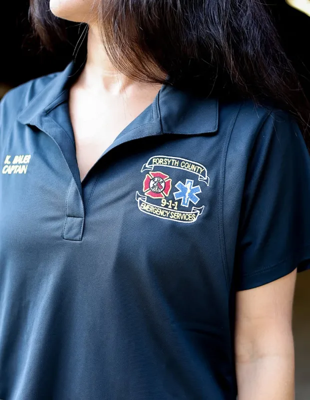 Custom embroidered polo shirt for front-facing local business staff by Sew NC